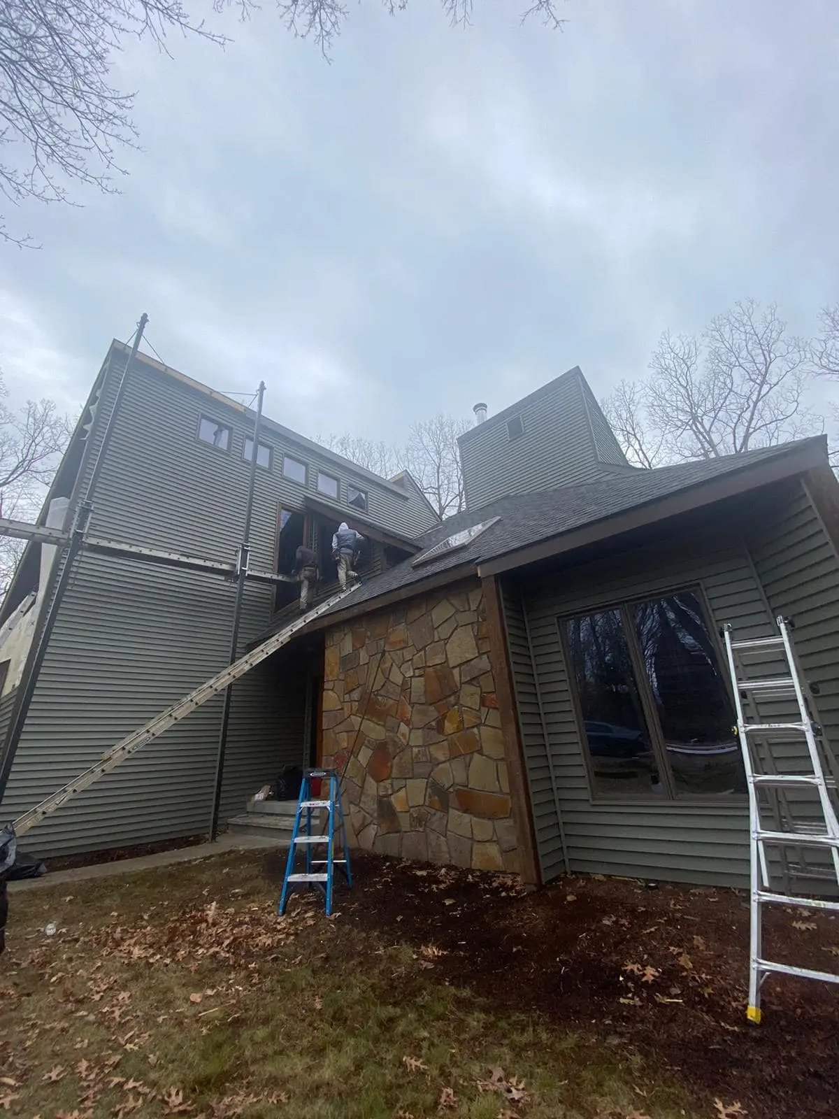 High Performance Construction during a roofing and siding project